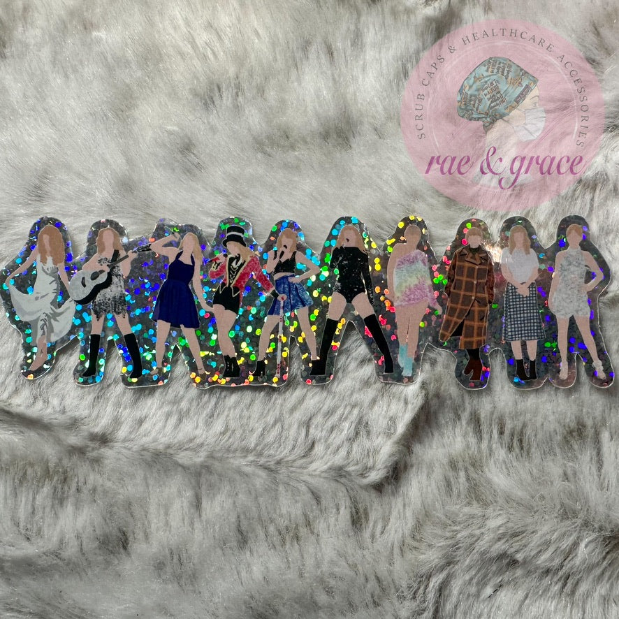 
            
                Load image into Gallery viewer, The Eras Tour Outfits - Glitter Sticker
            
        