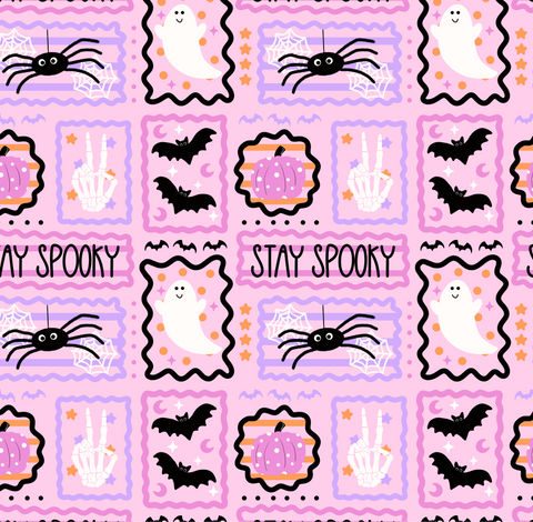A repeating Halloween-themed pattern on a light pink background, featuring black spiders, white ghosts in scalloped frames, black bats, orange pumpkins, white handprints, and the words “Stay Spooky.”.