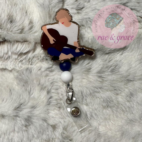 TS Playing Guitar - Badge Reel