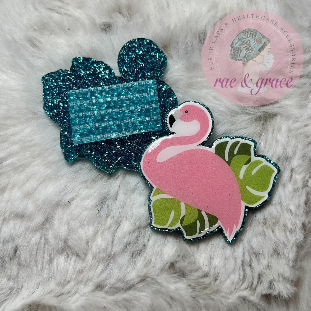 
            
                Load image into Gallery viewer, Flamingo on Palm Leaves - Badge Reel
            
        