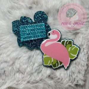 
            
                Load image into Gallery viewer, Flamingo on Palm Leaves - Badge Reel
            
        