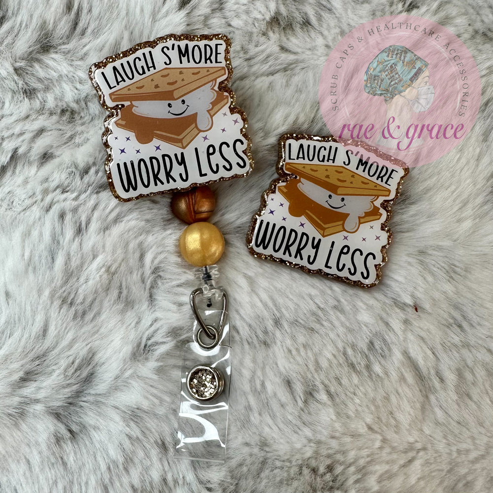 
            
                Load image into Gallery viewer, Laugh S&amp;#39;More Worry Less - Badge Reel
            
        