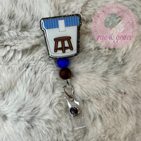 Stool Sample - Badge Reel