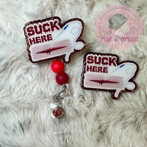 Suck Here - Badge Reel