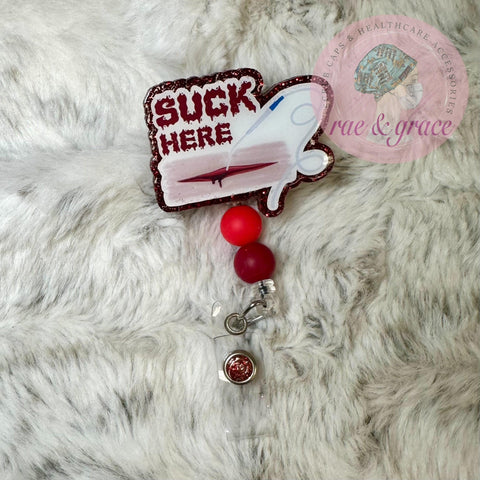 Suck Here - Badge Reel